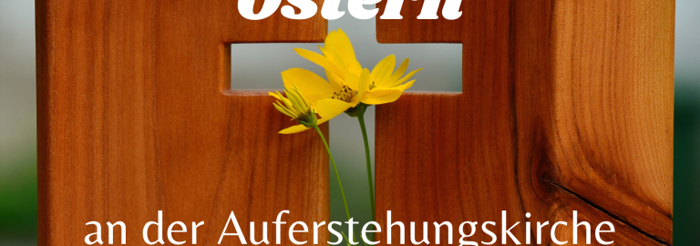 Text ostern an der Auferstehungskirche mit Bild von Blume in Kreuz